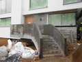 A 1400 mm wide concrete stair with solid concrete sides.